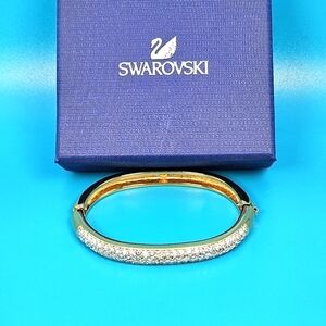 Swarovski authentic swan signed gold tone crystal hinged bangle bracelet…